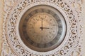 Vintage retro style clock on a wall. Royalty Free Stock Photo