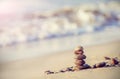 Vintage retro style image of stones on beach Royalty Free Stock Photo