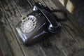 Vintage retro style telephone on wooden table Royalty Free Stock Photo