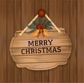 Vintage retro-styled wooden merry christams sign with bells. Royalty Free Stock Photo