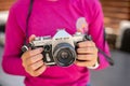 Vintage Ricoh SLR camera and girl