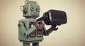 Vintage robot explores virtual reality technology Royalty Free Stock Photo