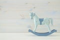 vintage rocking horse on wooden floor Royalty Free Stock Photo