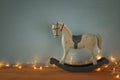 vintage rocking horse on wooden floor. Royalty Free Stock Photo