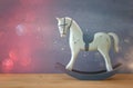 vintage rocking horse on wooden floor Royalty Free Stock Photo