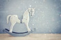 vintage rocking horse on wooden floor Royalty Free Stock Photo