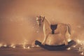 vintage rocking horse on wooden floor. Royalty Free Stock Photo