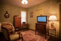 vintage room with classic furniture and modern conveniences, such as a flatscreen tv Royalty Free Stock Photo