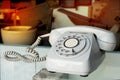 Vintage rotary landline telephone or wire telephone for contact us concept focus on dial-pad. Royalty Free Stock Photo