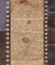 Vintage background with old newspaper and retro film strip Royalty Free Stock Photo