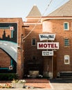 Vintage Route 66 signs and brick building in Pontiac, Illinois