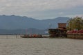 Vintage rowboat took the passengers across the coast at wharf in Kwan Phayao Thailand