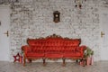 Vintage royal red sofa in a room
