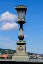 Vintage rusted lighting pole with clear blue sky in the background on SzÃÂ©chenyi Chain Bridge over Danube in Budapest, Hungary Royalty Free Stock Photo