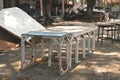 Vintage Rustic Wooden Tables/ Chairs/ Stools Painted in Teal/ White Colors in Outdoor Garage/ Abandoned Studio Backyard/ JunkYard