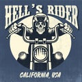 Vintage and rusty design of skull riding a motorcycle