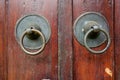 Vintage rusty doorknob on wooden classic door Royalty Free Stock Photo