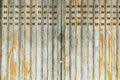 Vintage rusty folding door with star pattern cutouts Royalty Free Stock Photo