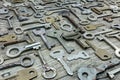 Rusty keys on gray rustic wooden background Royalty Free Stock Photo