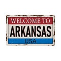 Welcome to Arkansas vintage rusty metal sign on a white background, vector illustration
