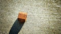 Vintage rusty nut bolt with shadow on concrete floor rough texture background Royalty Free Stock Photo