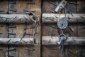 Vintage rusty padlock and old keys with old wooden door backgro Royalty Free Stock Photo