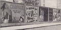 Vintage 1930s black and white photo of advertising street billboards / poster.