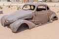 vintage 40\'s car-body worn down by rust in exibition at Betta, Namibia