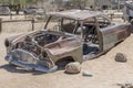 vintage 50\'s car-body worn down by rust in exibition at Solitaire, Namibia