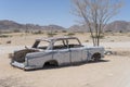 vintage 60\'s car-body worn down by rust in exibition at Solitaire, Namibia