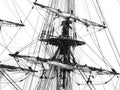 Vintage sailing ship mast ropes and tackle, Tall ship rigging mast detail, blue sky Royalty Free Stock Photo