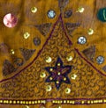 Vintage sari fabric with embellishments. Royalty Free Stock Photo