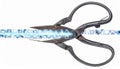 Vintage Scissors Cutting a Glowing Data Stream Royalty Free Stock Photo