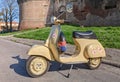 Vintage scooter Vespa with painted flowers