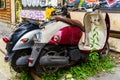 Vintage scooters stand deserted in an alley in old town of Bucharest, Romania, 2020