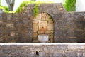 Vintage sculpture of a lion head fountain