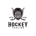 Vintage seal badge hockey sport logo with crossed hockey stick shield and helmet vector icon