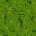 Vintage seamless exotic pattern with green random monstera print. Background with splashes