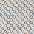 Vintage seamless geometric vector pattern with scratched old coin circles with holes on light beige background. Royalty Free Stock Photo