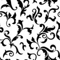 Vintage seamless pattern. Black luxurious Vegetative tracery of stems and leaves isolated on a white background.