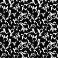 Vintage seamless pattern. White luxurious vegetative tracery of stems and leaves isolated on a black background. Royalty Free Stock Photo