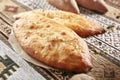 Vintage Serving Homemade Bread Lepeshka with Salt on Traditional Rustic Tablecloth