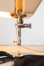 Vintage sewing machine closeup detail needle black thread fabric Royalty Free Stock Photo