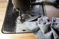 Vintage sewing machine and item of clothing, Close up & Macro shot, Selective focus, Tailor concept Royalty Free Stock Photo