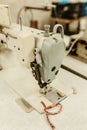 Vintage sewing machine in a room, with its details of the machinery on display Royalty Free Stock Photo