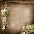 Vintage shabby background with faded roses, brooch and lace Royalty Free Stock Photo