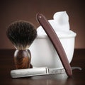 Vintage shaving equipment on wooden table