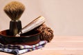 Vintage shaving tools, razor blade, brush and bowl on the wooden surface Royalty Free Stock Photo