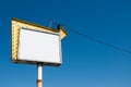 Vintage Sign on a Blue Sky Royalty Free Stock Photo