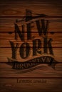 Vintage sign New York. Print on a wooden board. Vector.